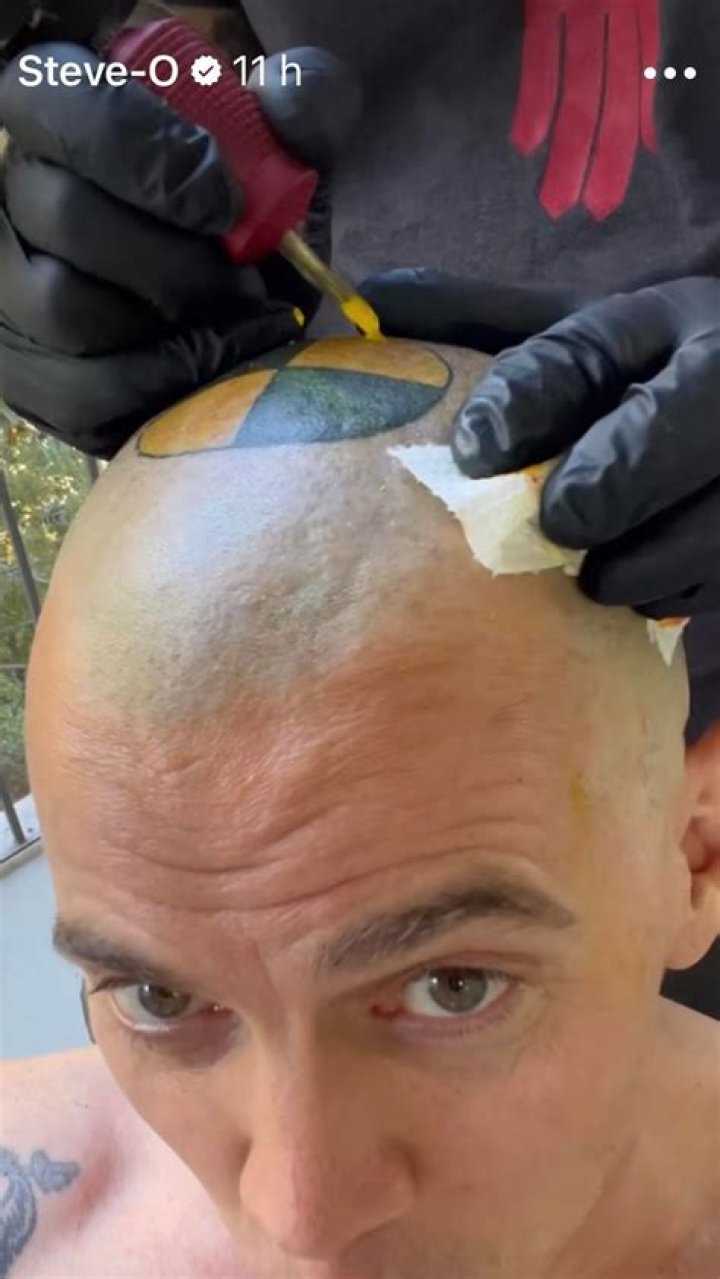 Travis Scott Gets Large New Head Tattoo