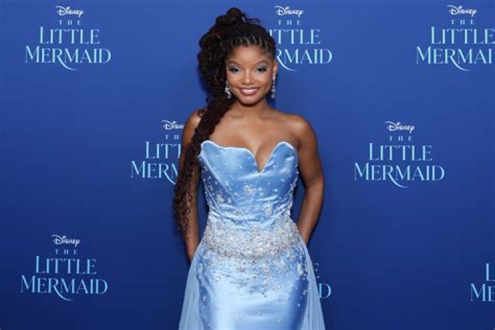 Halle Bailey Says She's A "Water Girl Forever" With New Swimsuit Post