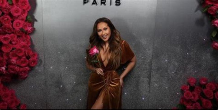 Adrienne Bailon Wore a $17 Forever 21 Dress to a ‘Vogue’ Event — and She’s Our Hero!