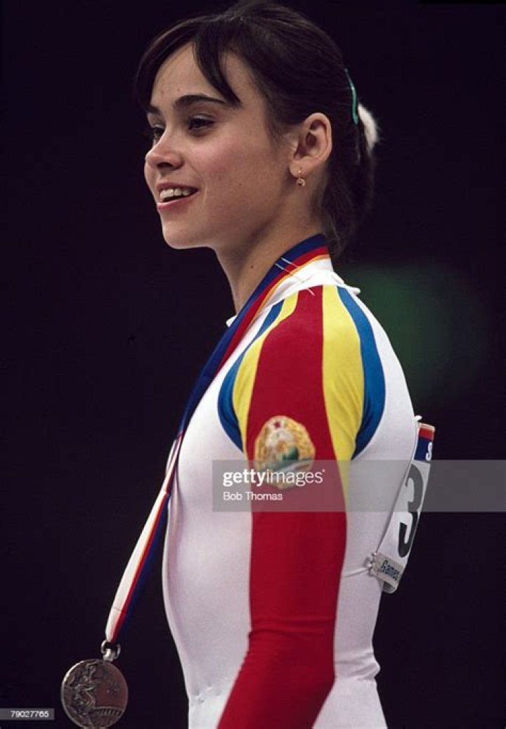 Aurelia Dobre (Gymnast) - Age, Birthday, Bio, Facts, Family, Net Worth, Height & More