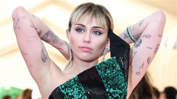 Miley Cyrus’ Many Tattoos Are Edgy, Trendy and Cool — Here’s a Definitive Guide to All Her Ink